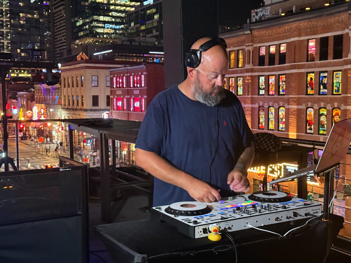 DJ Mac at the booth